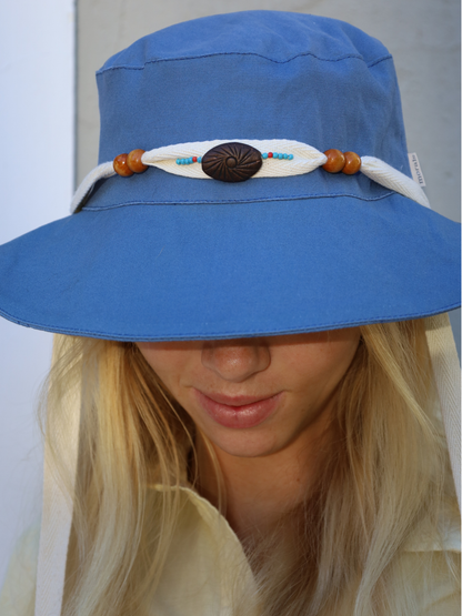 Blue Midi sun hat with decorative band featuring beads and a button, Made in South Afrtica