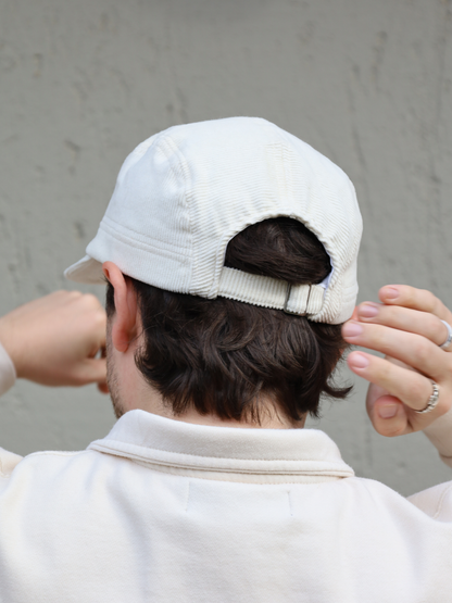 Cream corduroy cap with adjustable back