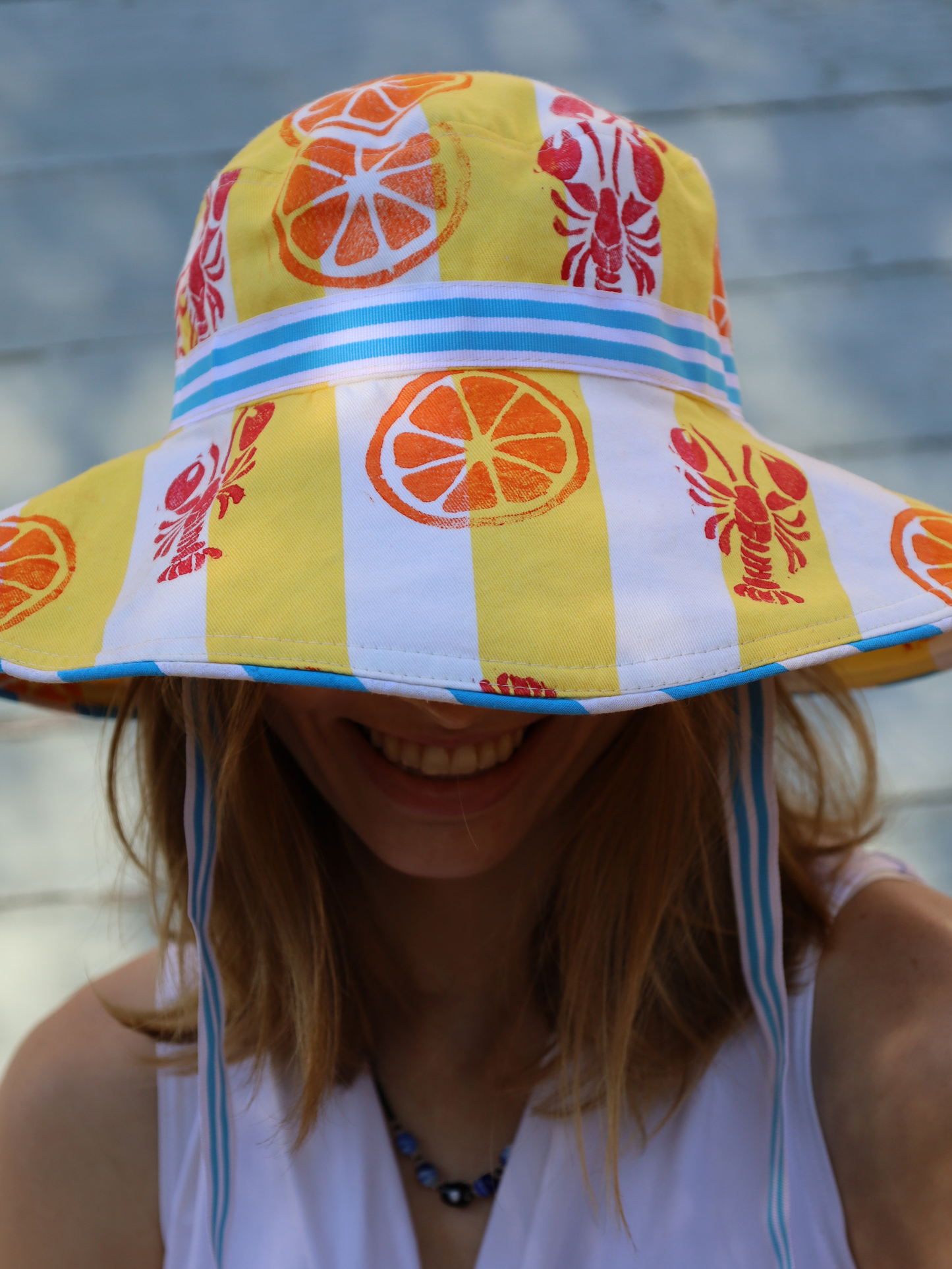 Colorful bucket hat with orange and lobster pattern Made in South Africa