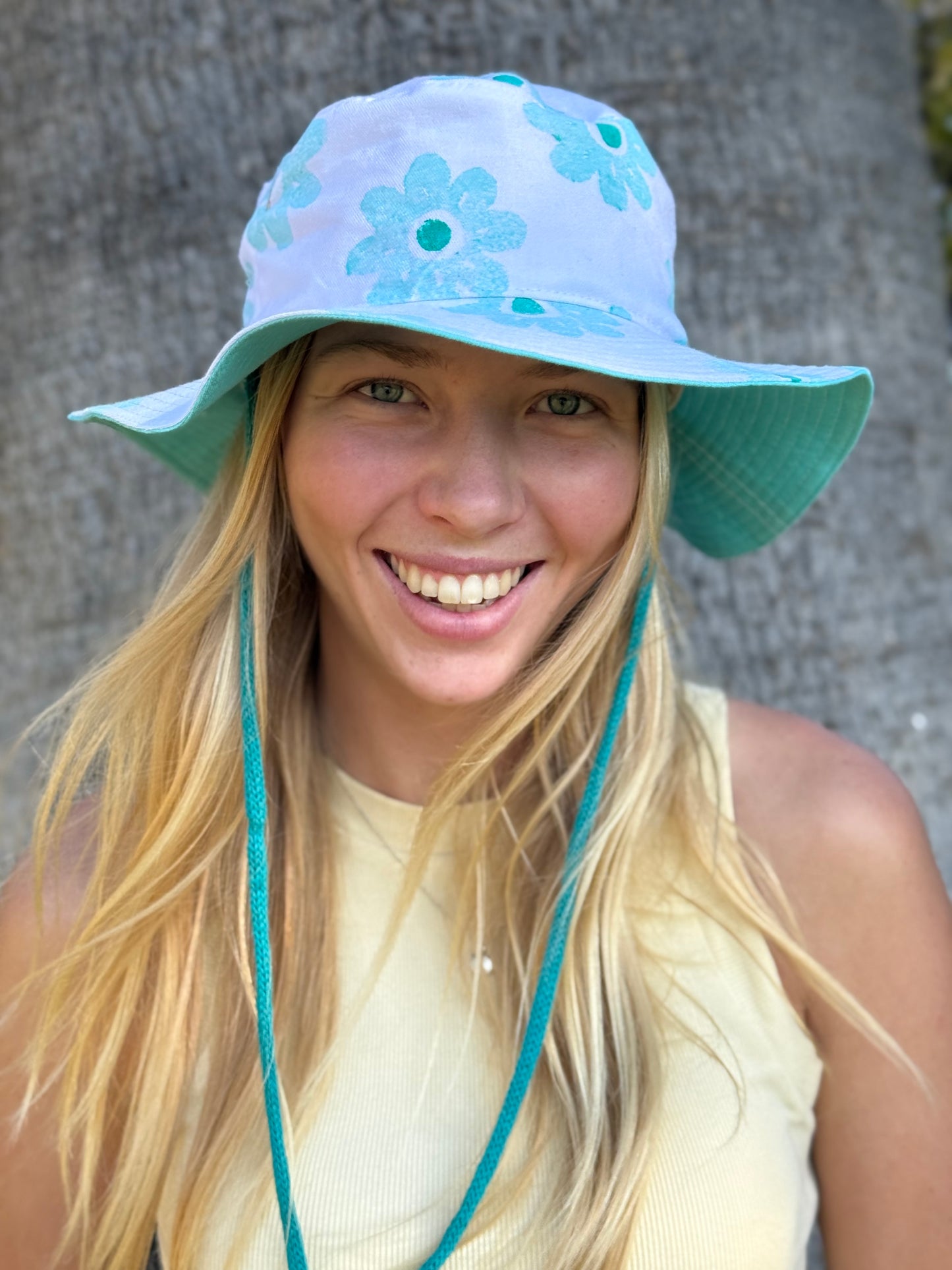 Morals the brand hat with green flowers