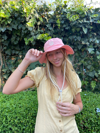 Handmade hat with Morals the brand Logo in peach pink