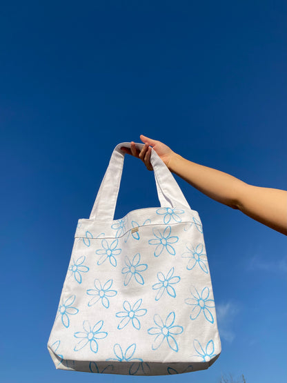 Handmade tote bag with blue daisy print handprinted by Morals the brand