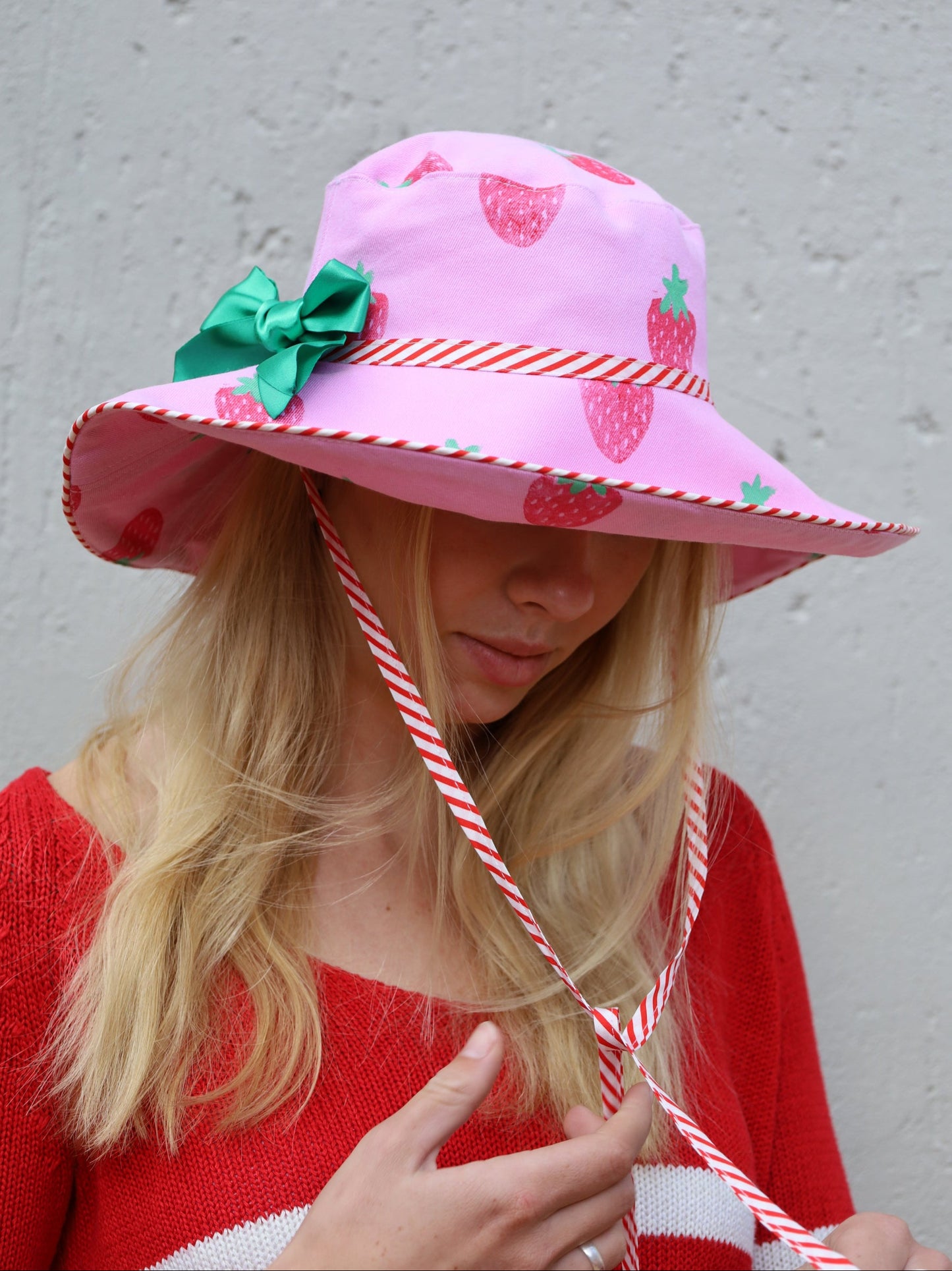 Pink handmade wide brimmed sun hat in pink